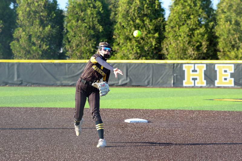 Herscher's Emery Fritz throws to first base during the Tigers' 14-10 loss to Coal City on Monday, April 20, 2026.