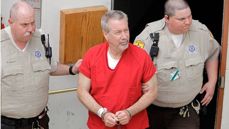 Drew Peterson leaves the Will County Courthouse in Joliet after his arraignment on charges of first-degree murder in the 2004 death of his former wife Kathleen Savio, who was found in an empty bathtub at home.
