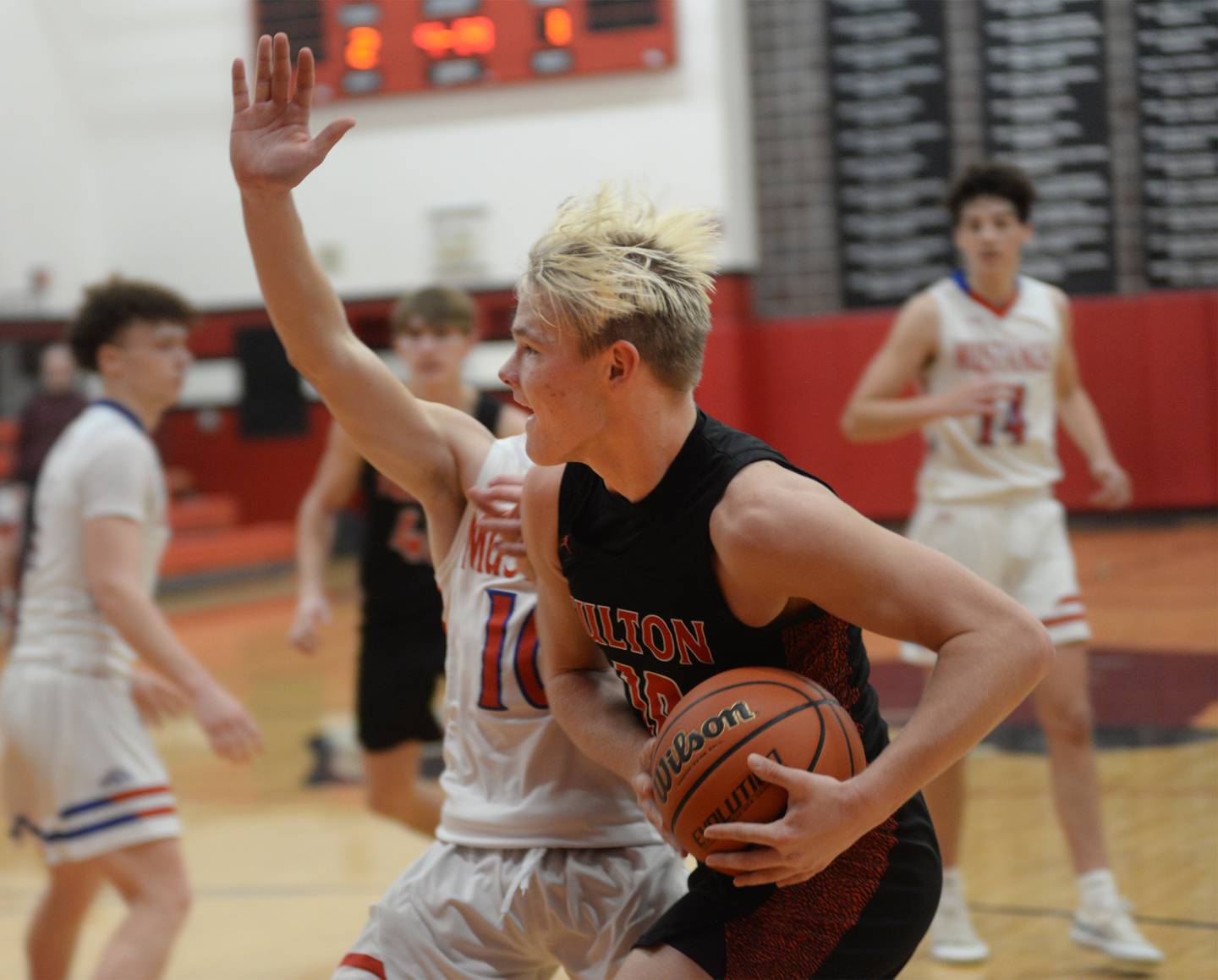 Fulton's Don Kramer (10) drives to the basket against Morrison on Saturday, Dec. 30, 2023 at the Warkins Memorial Tournament at Erie High School.