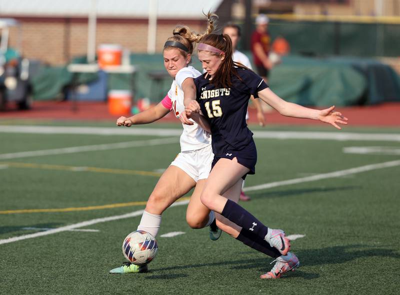 IC Catholic's Allie Geiger (15) fights for the ball during the IHSA Class 1A girls soccer super-sectional match between Richmond-Burton and IC Catholic at Concordia University in River Forest on Tuesday, May 23, 2023.