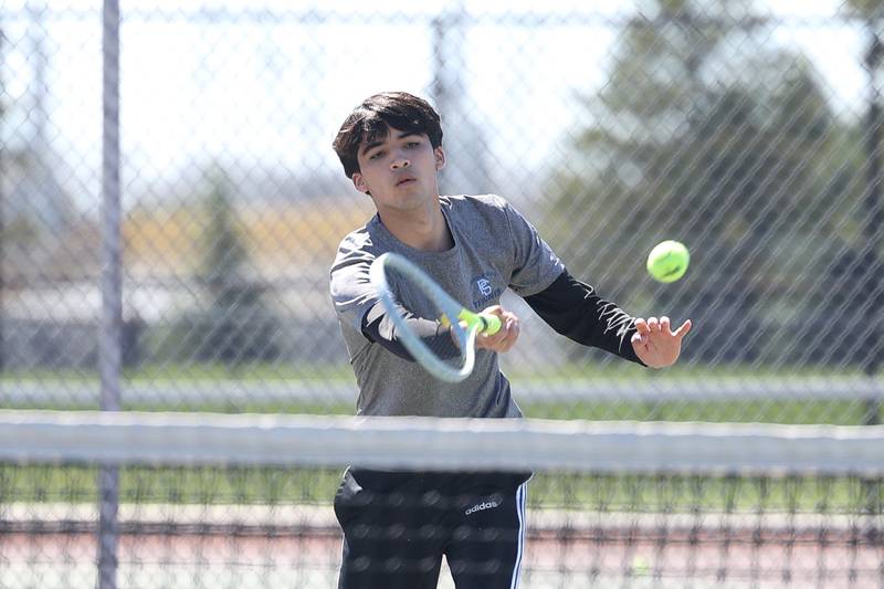 Plainfield South’s Arman DeAlba returns a shot against Joliet Catholic’s Eli Zelinski on Saturday, April 6, 2024 in Joliet.