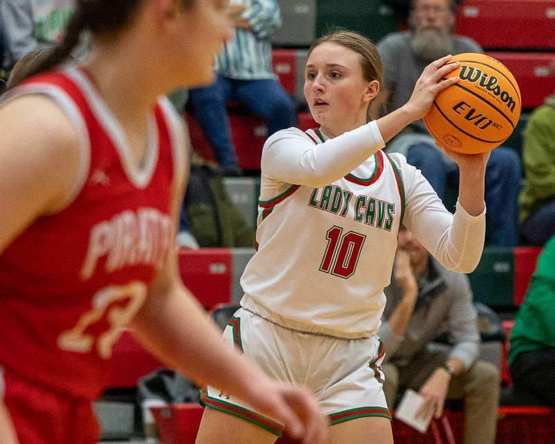 Ella McCauley (10) of LaSalle-Peru holds ball looking for pass on Wednesday, December 17, 2025 at Sellet Gymnasium in LaSalle.