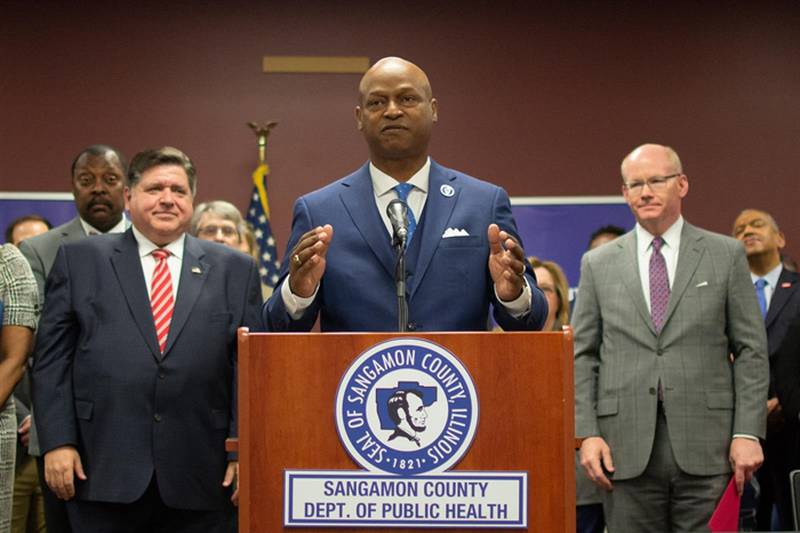 Gov. JB Pritzker, left, and Democratic leaders of the General Assembly couldn't come to a budget agreement as of Friday's scheduled end of the legislative session. House Speaker Emanuel "Chris" Welch, center, and Senate President Don Harmon, right, announced that the session will be extended through next week, still well ahead of a May 31 deadline after which a three-fifths majority vote would be required to pass bills with an immediate effective date. They're pictured at an event in Springfield earlier this month.