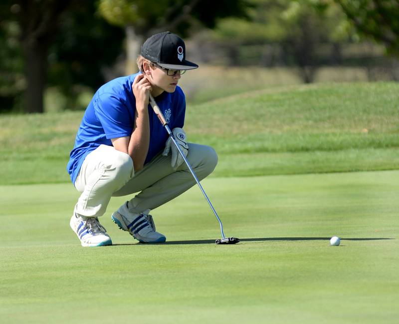 Sterling Newman's Chase Becker contemplates a putt at the 1A Lanark Regional at Lake Carroll Golf Course on Wednesday, Oct. 2, 2024.