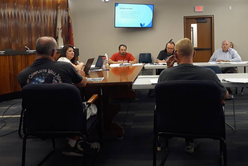 Streator Mayor Tara Bedei (left) leads a discussion on emergency ambulance service Tuesday, June 14, 2022, with the rest of the council (facing left to right) Matt McMullen, Jacob Darby and City Manager David Plyman (backs left to right); along with Brian Crouch and Timothy Geary at City Hall.