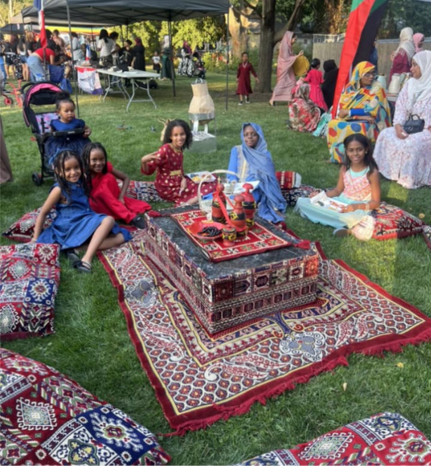 At the Palestine tent during Jefferson Elementary School's annual Multicultural Night in DeKalb on Sept. 13, 2024,, students and families are treated to Musakhan, a roast chicken dish seasoned with onion, sumac and olive oil, served on taboon bread.