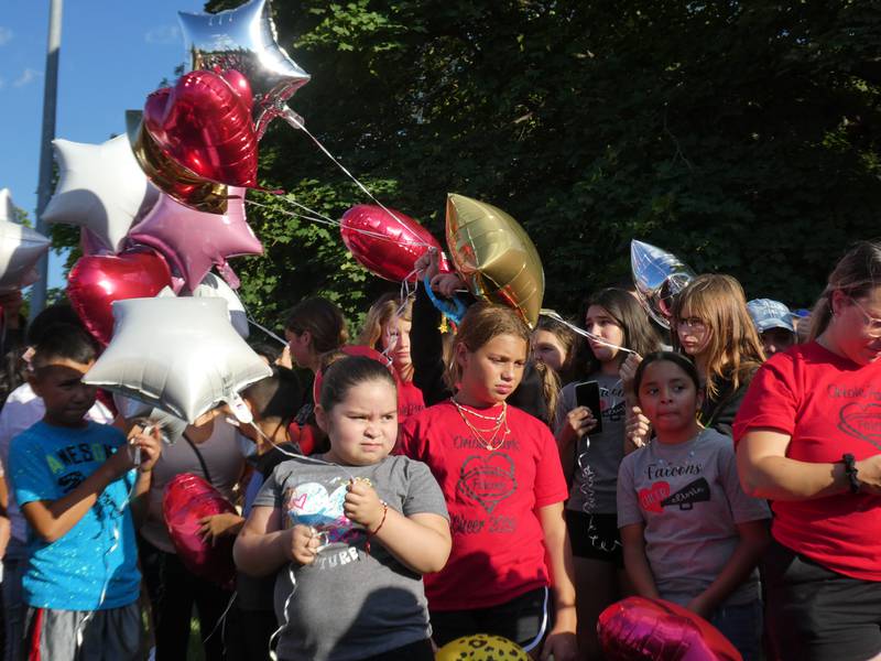 A prayer vigil and balloon release was held at Oriole Park in Chicago on Monday night, August 1, 2022 to mourn the loss of seven killed, including Lauren Dobosz and her four children, in a tragic car crash that occurred Sunday on I-90 near Hampshire.