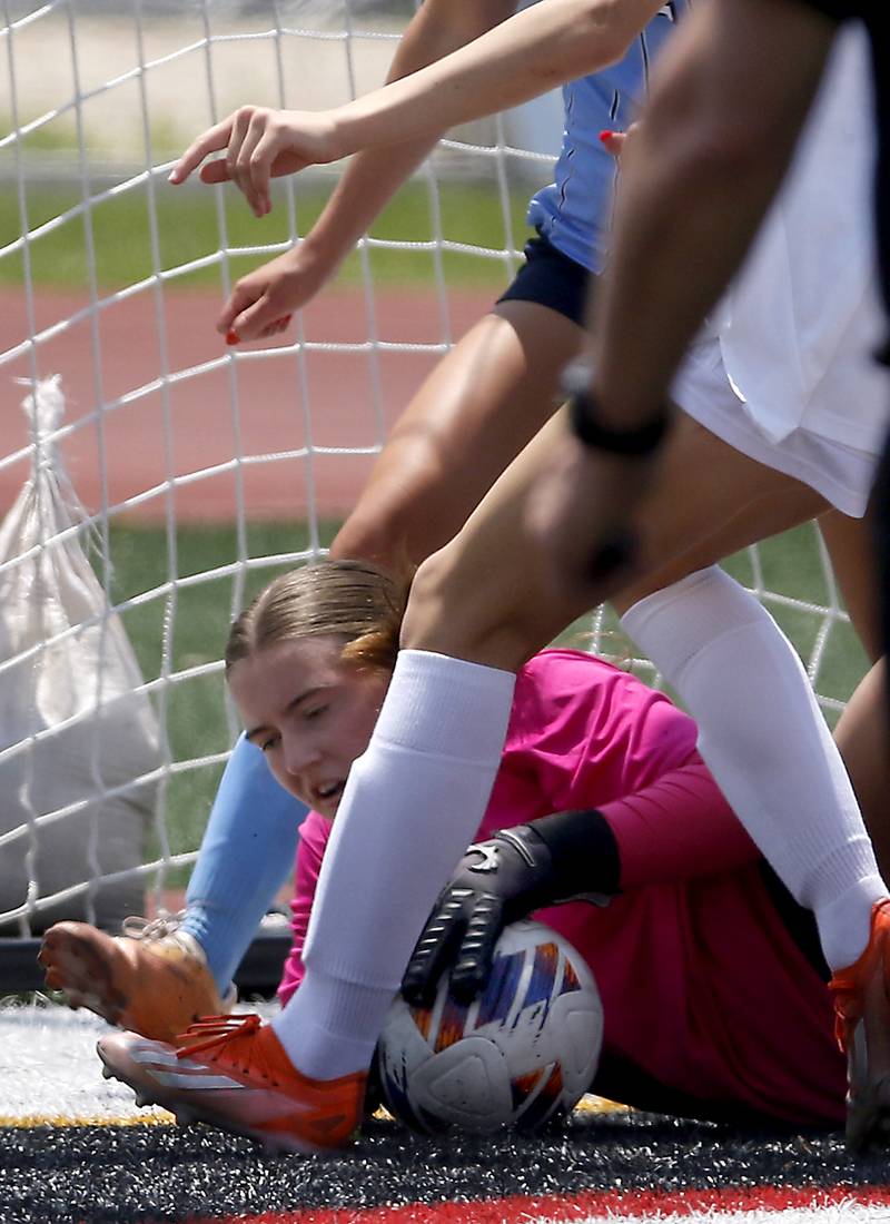 Nazareth Academy's Ana Djurasovic grabs the ball to stop a Nazareth Academy goal during a IHSA Class 2A State Girls Soccer semifinal match on Friday, June 6, 2025, at North Central College in Naperville.