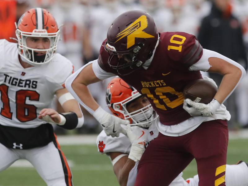 Richmond-Burton's Luke Robinson fights for yards after catching a pass during an IHSA Class 3A semifinal playoff football game against Byron on Saturday, November 22, 2025, at Richmond-Burton High School, in Richmond.