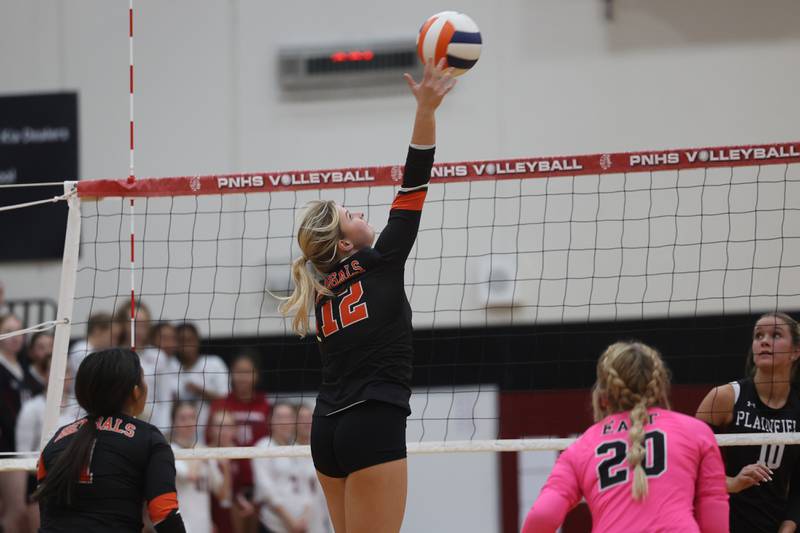 Plainfield East’s Faith Fitzgerald hits a shot against Plainfield North on Tuesday, Oct. 10, 2023 in Plainfield.