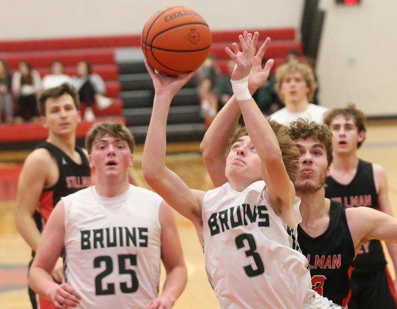 St. Bede's Alex Ankiewcz eyes the hoop while cutting in front of Stillman Valley's Ethan Szarkowicz during the 49th annual Colmone Class on Thursday, Dec. 7, 2023 at Hall High School.