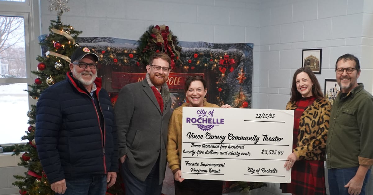 City of Rochelle presents facade grant to Vince Carney Community Theater