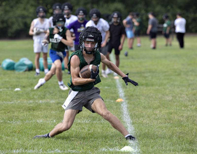 Rock Falls’ Logan Thome goes over route drills Tuesday, August 12, 2025. The team hit the gridiron for day two of practices ahead of the 2025 season.