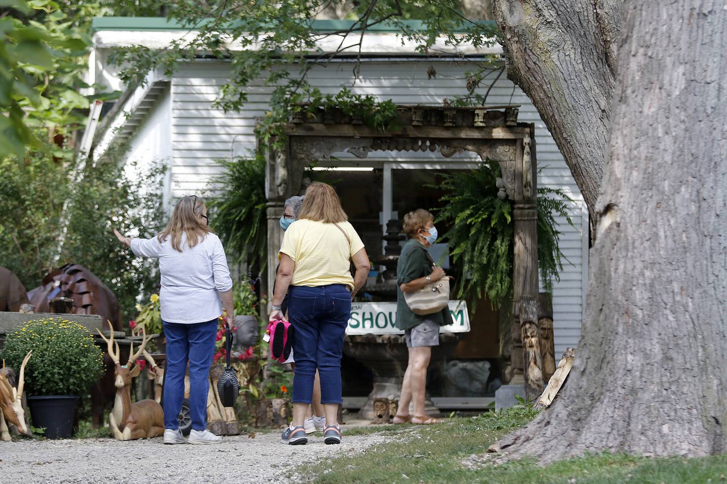 Customers check out the items for sale at Ginger Blossom on Wednesday, Sept. 15, 2021 in Richmond.  Blossom will be closing her business by the end of the year.