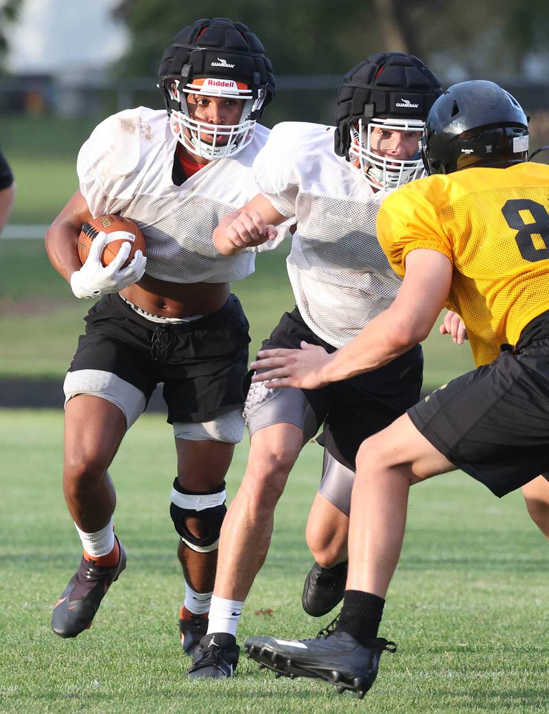 Lena-Winslow and Byron scrimmage Thursday, July 24, 2025, during a joint practice with Byron, Lena-Winslow and Sycamore at Sycamore High School.