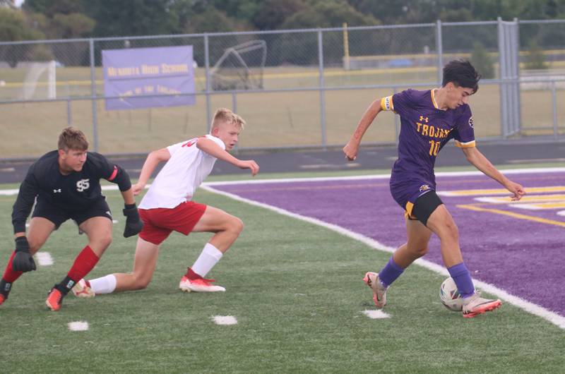 Mendota's Johan Cortez scores a goal on a break away over Streator keeper Andrew Vogel and teammate Joe Hoekstra on Monday, Sept. 23, 2024 at Mendota High School.