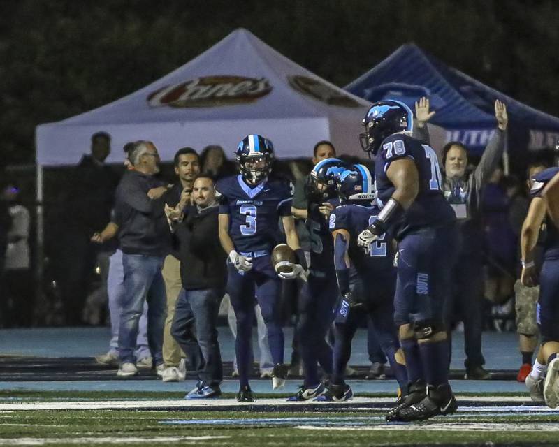 Downers Grove South's Aidan Kanazawa (3) celebrates his touchdown reception during football game between Downers Grove North at Downers Grove South Friday, Sept 5, 2025  in Downers Grove.