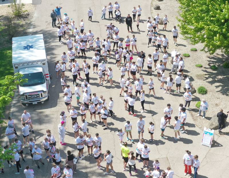 Hundreds of runners line up at the starting line for the Color Fun Run on Sunday, April 26, 2026 at Lake Mendota.