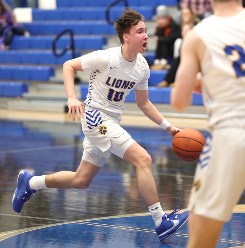 Lyons Township's Jimmy Pajauskas drives the lane Monday, Jan. 15, 2023, during their game against DeKalb in the Burlington Central Martin Luther King Jr. boys basketball tournament.