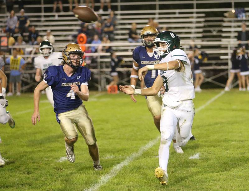 St. Bede quarterback Gino Ferrari throws an incomplete pass down the field against Marquette on Friday, Sept. 26, 2025 at Gould Stadium in Ottawa.