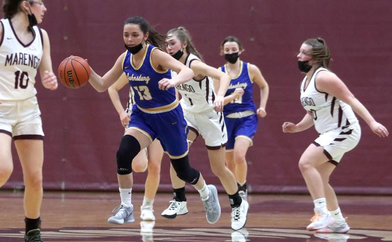 Johnsburg’s Macy Madsen leads a break down the court during girls varsity basketball action in Marengo Thursday night.