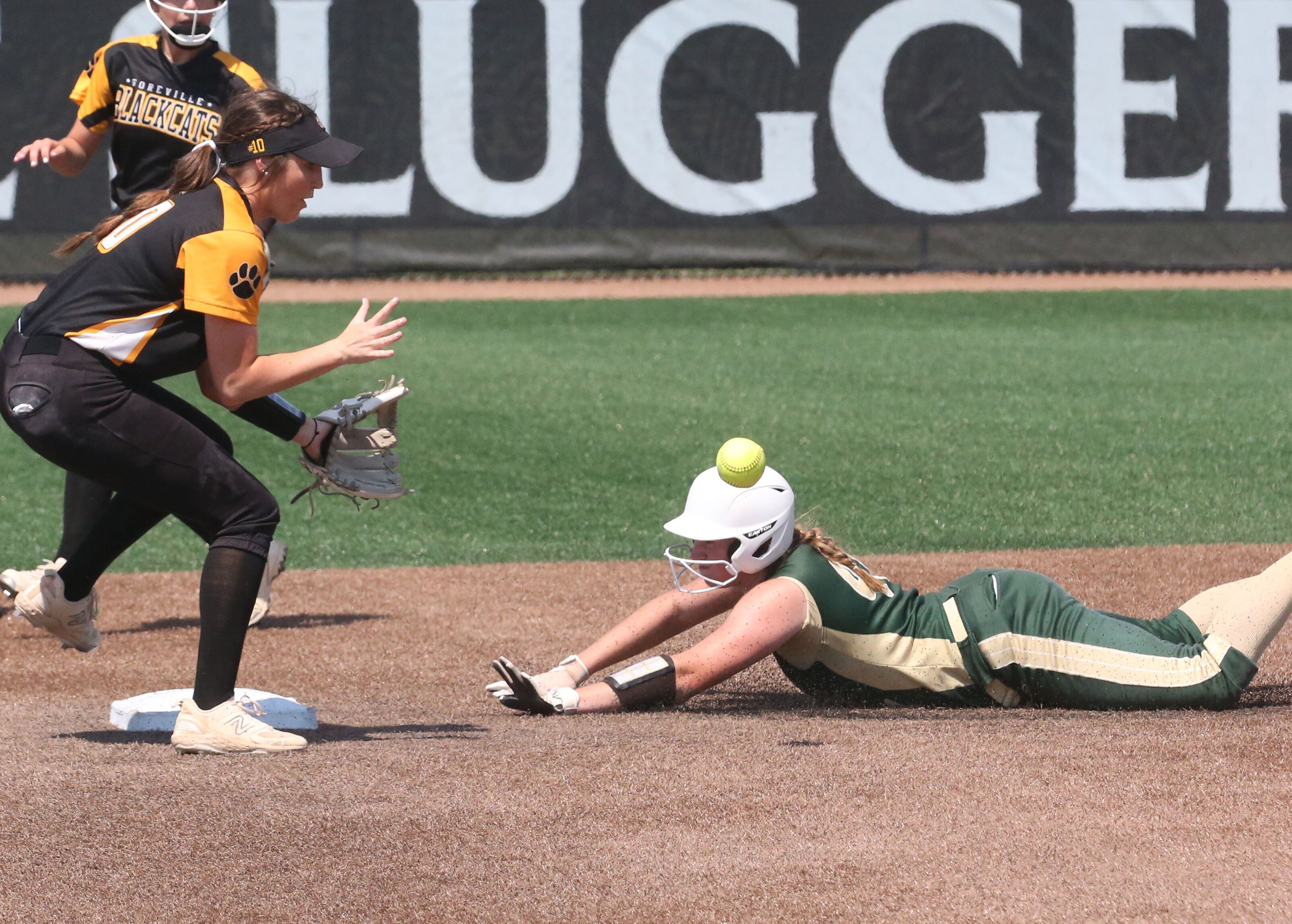 St. Bede's Reagan Stoudt slides into second base safely while Goreville's Brea Suits waits for the late throw in the Class 1A State semifinal game on Friday, June 2, 2023 at the Louisville Slugger Sports Complex in Peoria. 