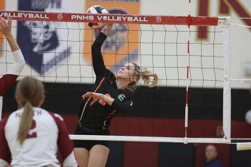 Plainfield East’s Sophia Williams hits a shot against Plainfield North on Thursday night.