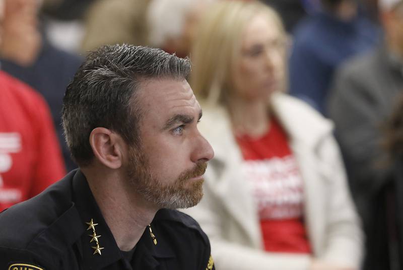 McHenry County Sheriff Robb Tadelman listens to public comments at McHenry County's Law and Government Committee meeting on Tuesday, Jan. 31, 2023, at the McHenry County Administration Building in Woodstock. The committee held a public comment period before it considered a resolution to oppose Illinois' new gun ban and support its repeal.