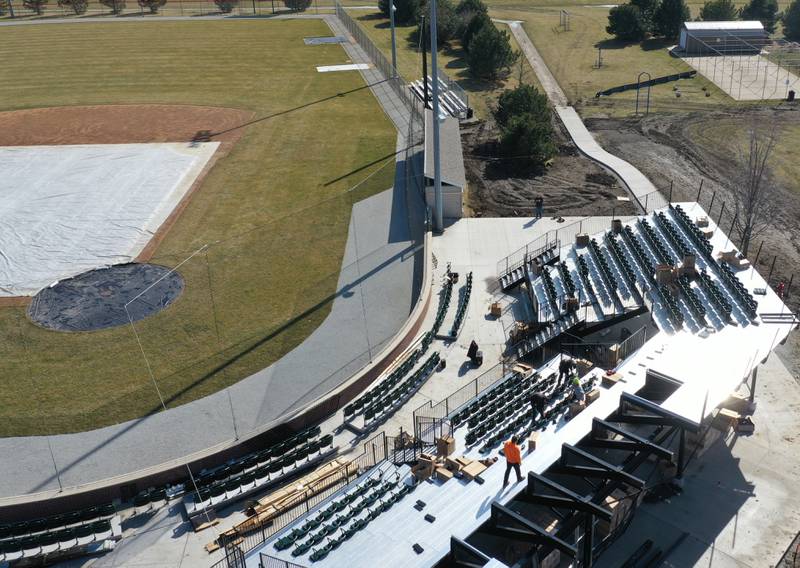 Workers from Hayden Construction installed box seats at Schweickert Stadium on Monday, March 6, 2023 in Peru. The stadium home of the Pistol Shrimp grandstand was approved by the Peru City Council last June. This phase included 575 box seats, a new grandstand and press box.