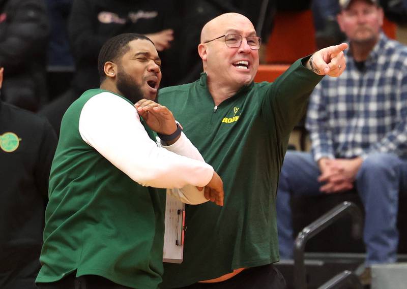Waubonsie Valley coaches aren’t happy with a call during their game against DeKalb Friday, Feb. 21, 2025, at DeKalb High School.