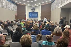 After 5-hour heated meeting, vote delayed for Cary apartment complex with controversial road extension
