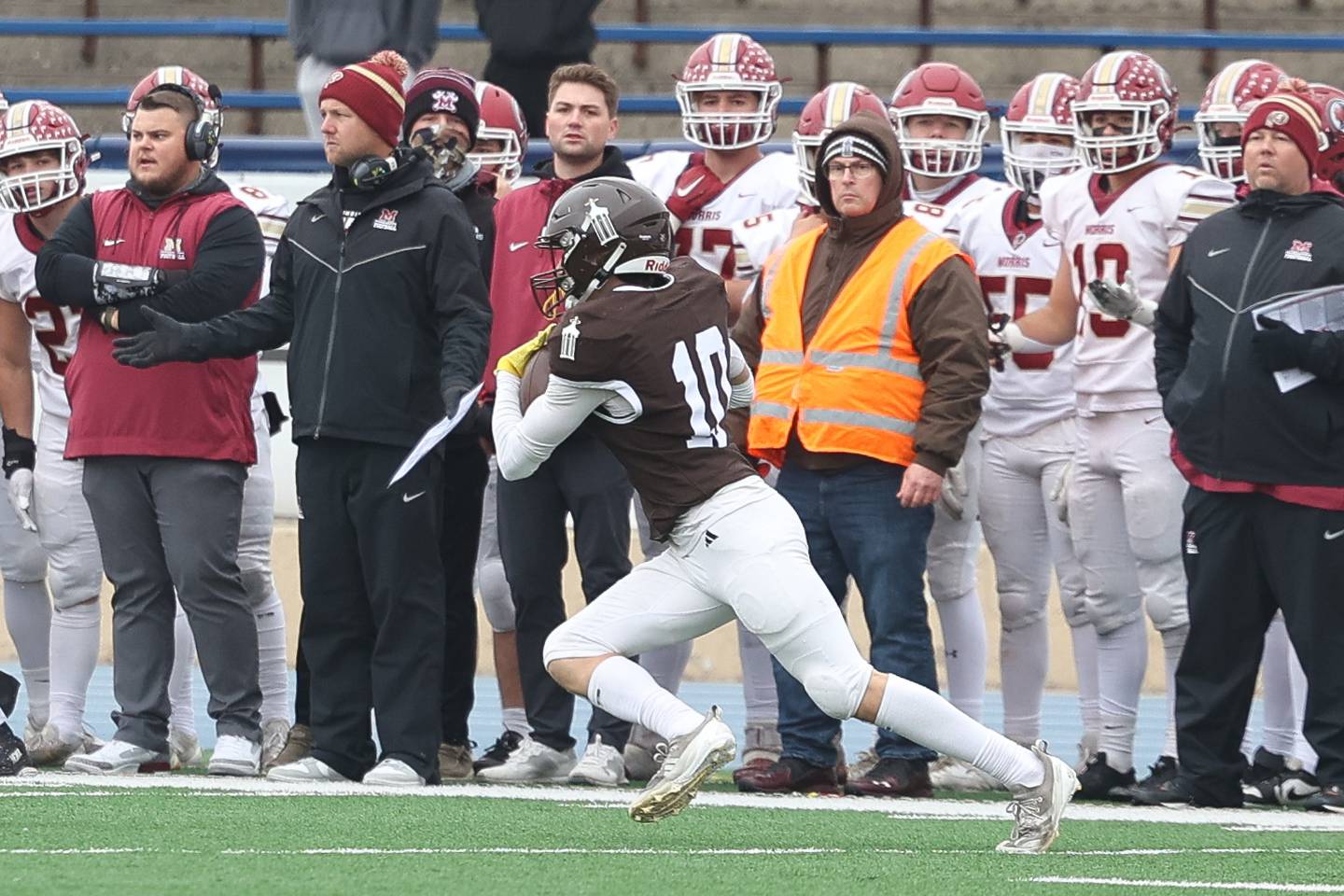 Joliet Catholic’s Mikey Brow returns an interception against Morris in the Class 5A semifinal on Saturday, Nov. 23, 2024.