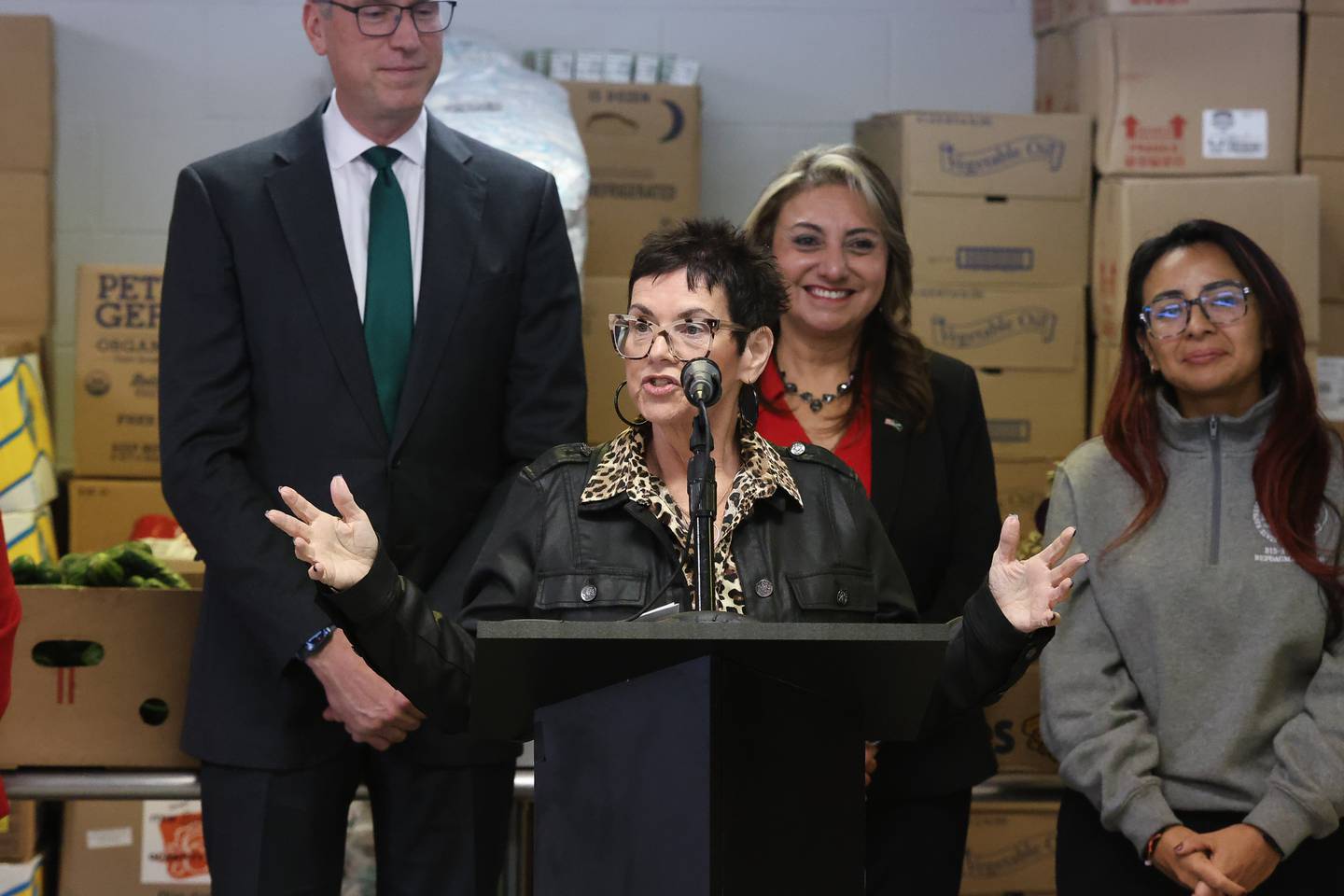 Illinois State Rep. Natalie Manley speaks at a press conference to announce a $5,499 donate by the Illinois Treasury Department for the 4 K.I.D.S Sake food pantry on Thursday, Dec. 18, 2025 in Bolingbrook.