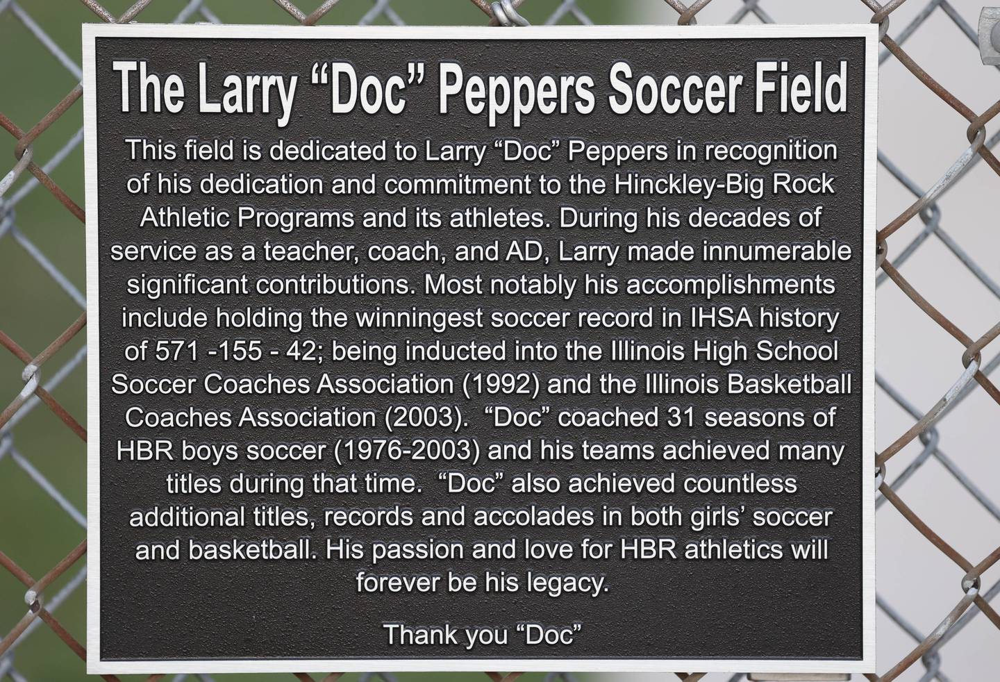 New signage honoring Larry “Doc” Peppers adorns the soccer field Wednesday, Oct. 2, 2024, at Hinckley-Big Rock High School.