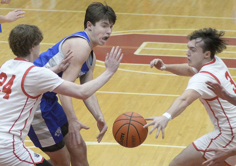 As Ottawa’s Trace Noether defends, Princeton’s Noah Laporte has the ball knocked away by Ottawa’s Levi Sheehan in the 2nd period in Kingman Gymnasium on Saturday, Jan. 21, 2023 at Ottawa High School.