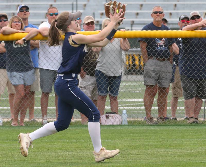 Marquette's Emma Rinearson makes a catch in right field during the Class 1A Illinois Wesleyan Supersectional on Monday, May 29, 2023, in Bloomington.
