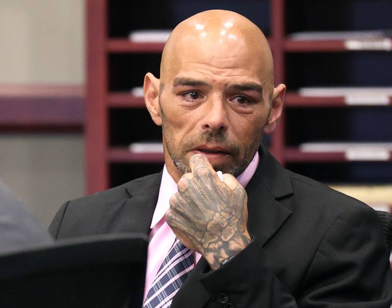 Nathan P. Sweeney, 45, of DeKalb, becomes emotional as he apologizes to Christina Musil’s loved ones Tuesday, Aug. 26, 2025, while reading a statement during his sentencing hearing at the DeKalb County Courthouse in Sycamore. Sweeney received 14 years in prison for driving under the influence and causing the 2024 crash that killed Musil, a mother, sheriff's deputy and military veteran.