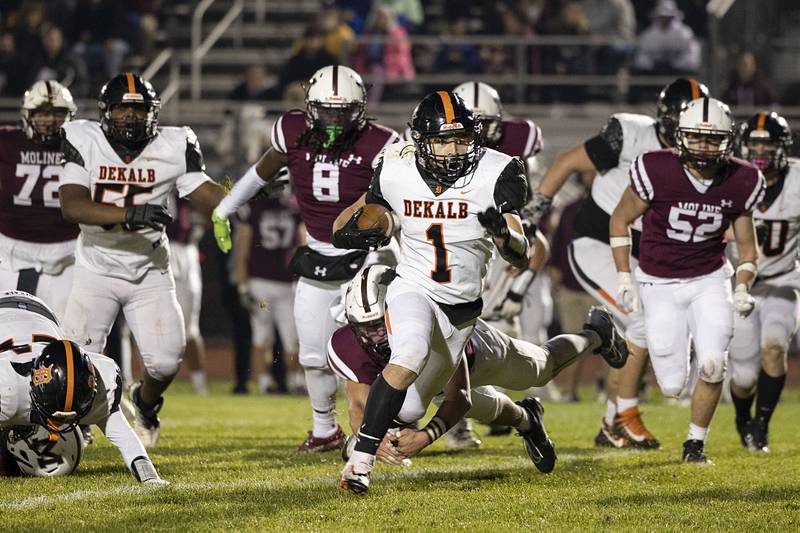 DeKalb's Talen Tate gets passed the Moline defense on his way for a touchdown Friday, Oct. 28, 2022 in round one of the football playoffs.
