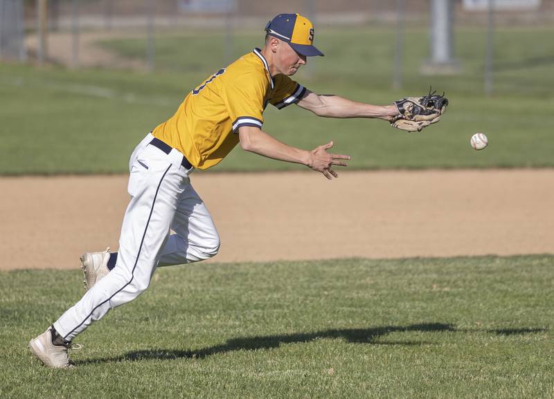 Sterling’s Bryce Hartman can’t handle an infield single against Dixon Friday, May 23, 2025.