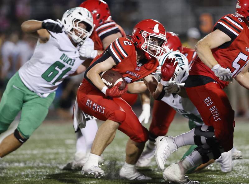 Hinsdale Central's Patrick Connors (2) tries to get past the defense during the varsity football game between York and Hinsdale Central on Friday, Oct. 3, 2025 in Hinsdale, IL.