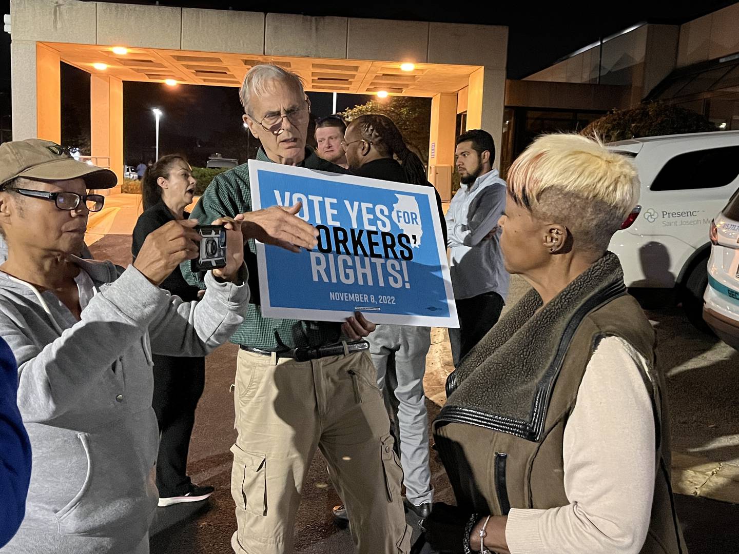 Pat Meade (right), treasurer for the St. Joseph Nurses Association, attends a rally for nurses at Ascension Saint Joseph Medical Center in Joliet on Saturday, Oct. 22, 2022.