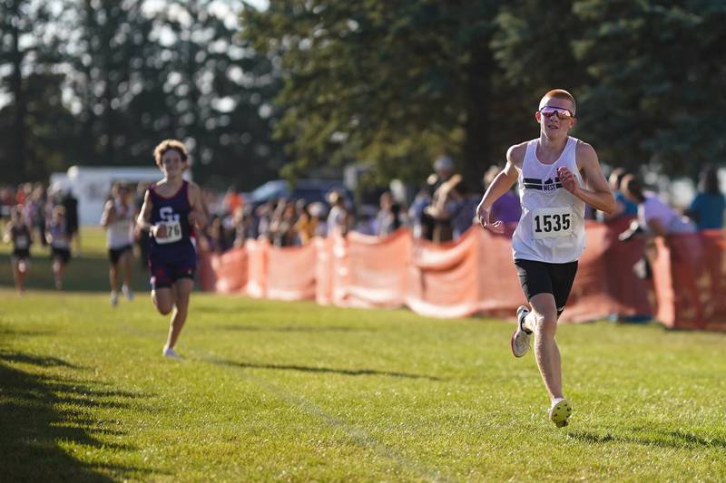 Glenbard West’s Cayden Camp competes in the Eddington cross country invitational at Kaneland High School in Maple Park on Saturday, Sep 21, 2024.