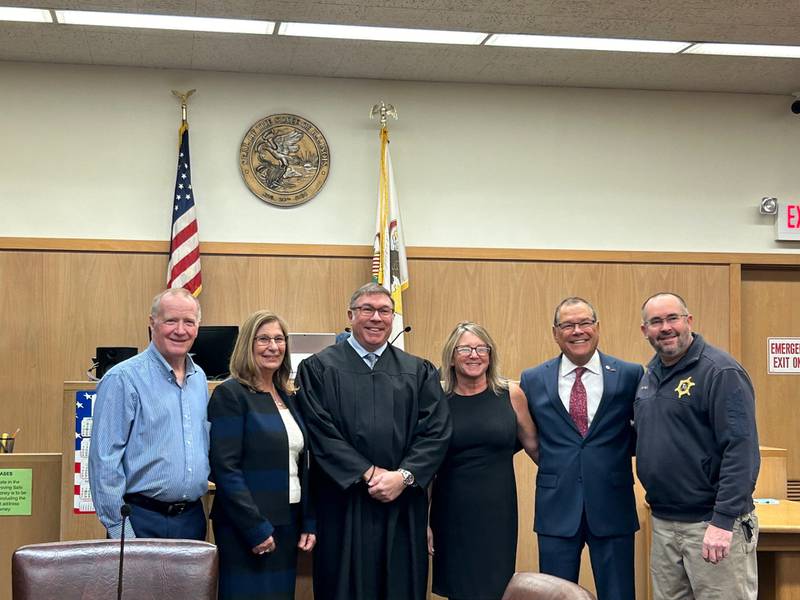 The winners of the Nov. 5 elections in La Salle County were sworn in during a ceremony Wednesday, Nov. 27, 2024, in the county's downtown courthouse. From left are Greg Vaccaro, circuit clerk; Karen Friestad Miller, recorder; Circuit Judge Todd L. Martin; Stephanie Jo Thompson, auditor; Joe Navarro, state's attorney; and Rich Ploch, coroner.