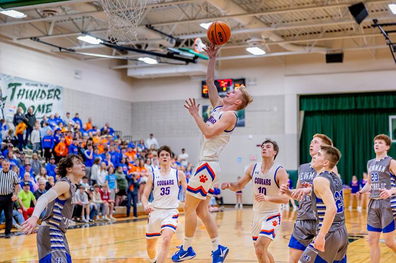 Eastland senior Adam Awender goes up for a layup against the Newman defense during the third quarter of the Regional championship game on Friday, February 28, 2025.
