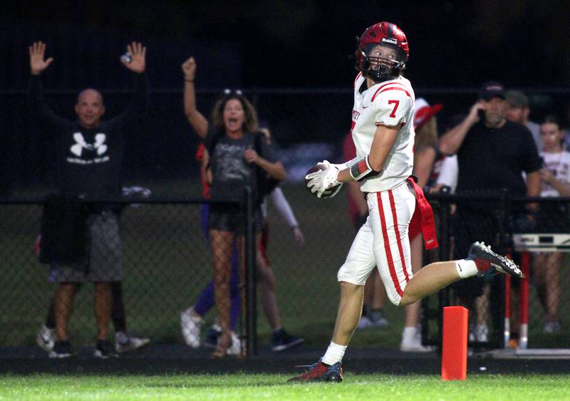 Huntley’s Wyatt Fleck enters the end zone on a touchdown in varsity football on Friday, Aug. 30, 2024, at Metcalf Field on the campus of Crystal Lake Central High School in Crystal Lake.