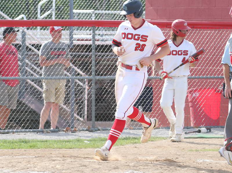 Streator's Brady Grabowski scores a run against Ottawa on Tuesday, May 16, 2023 at Streator High School.