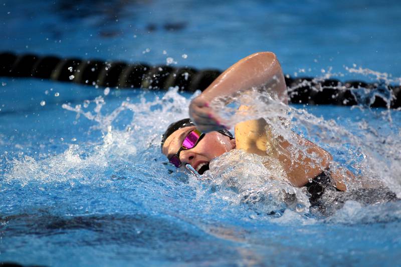 Crystal Lake South’s Abigal Uhl swims the 200-yard freestyle during the IHSA Girls State Championships preliminaries at the FMC Natatorium in Westmont on Friday, Nov. 11, 2022.