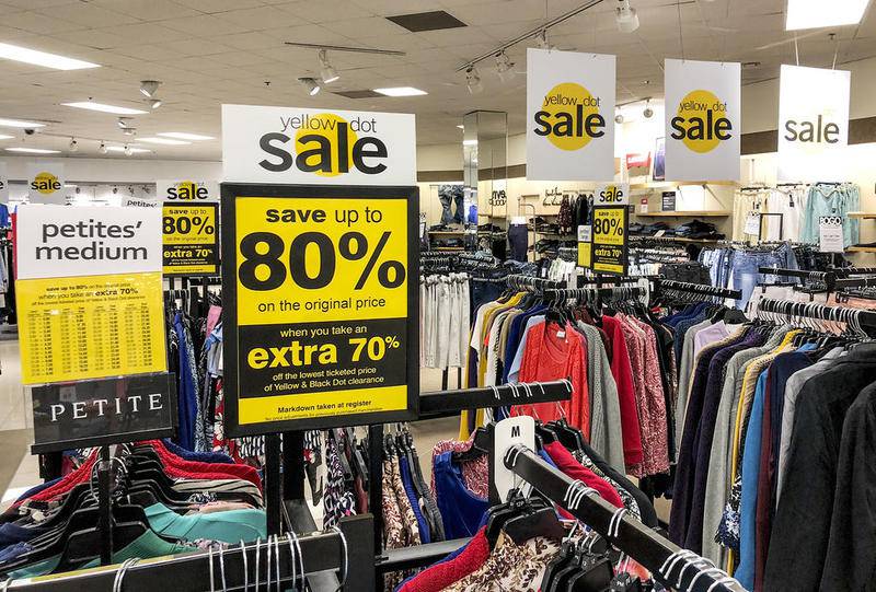 Racks of clothes and advertisements line the walls of Carson's department store Wednesday, April 18, 2018, at the Louis Joliet Mall in Joliet, Ill. The Chicago-based retailer announced Wednesday their stores were closing.