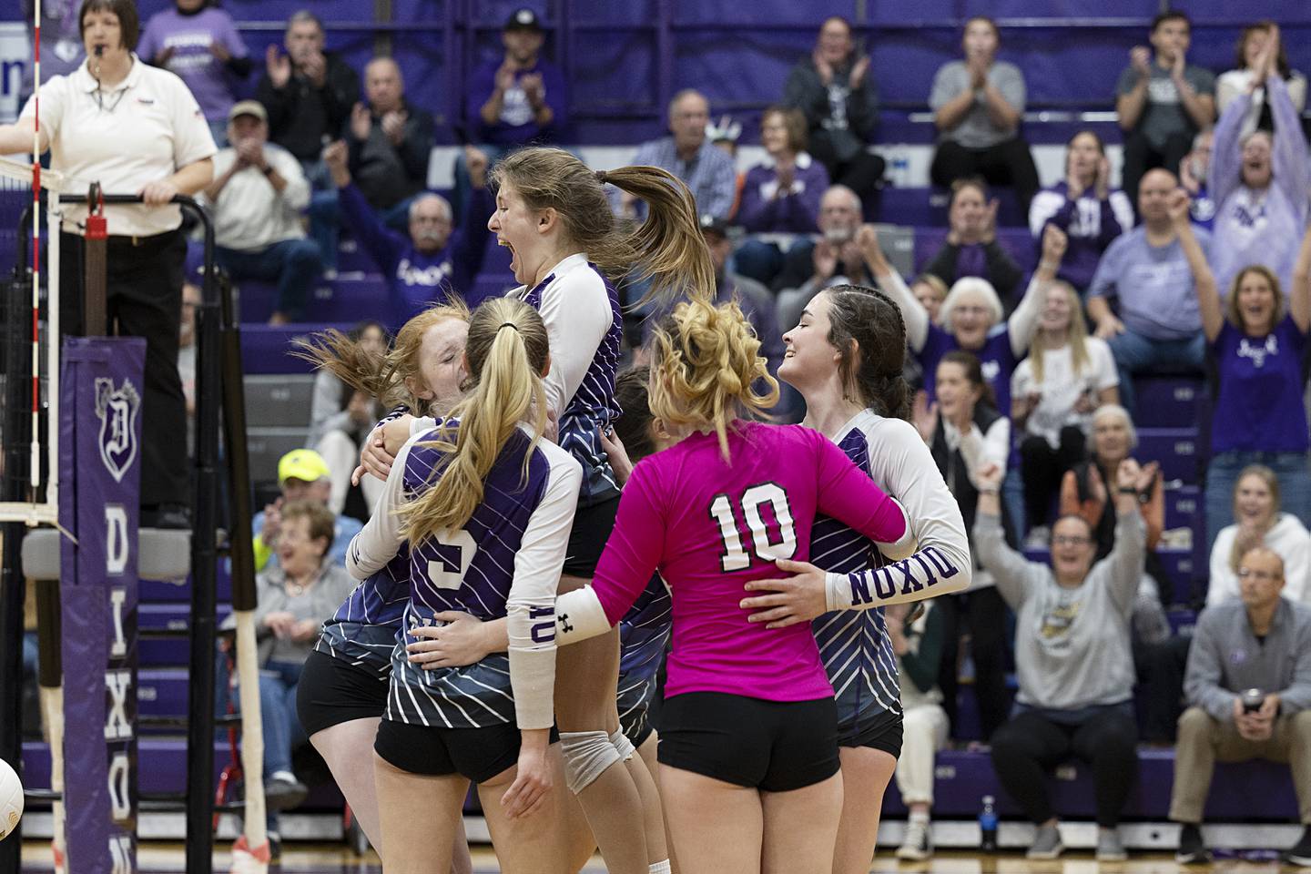 Dixon celebrates winning game one Thursday, Oct. 27, 2022 in the volleyball regional final against Galesburg. The Duchesses went on to win the match.