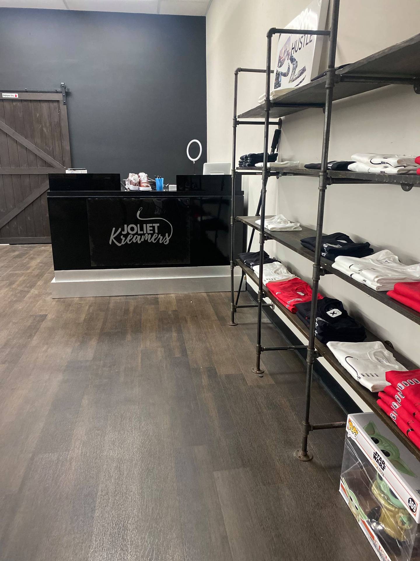 In addition to being the place for buying, trading and selling sneakers, Joliet Kreamers in downtown Joliet also sells shirts and other apparel.